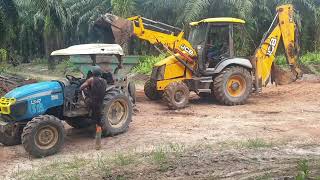 Jcb 3dx Load Laterite to LS Tractors for road paving