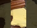 A food dough that is being formed by a chef meticulously