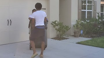 Man catches gator in trash can, releases it back to the water