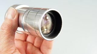 Adapting projector lenses to digital cameras.  Including pros and cons of using projector lenses.