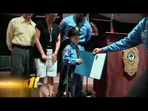 8 YEAR OLD POLICE OFFICER LAID TO REST