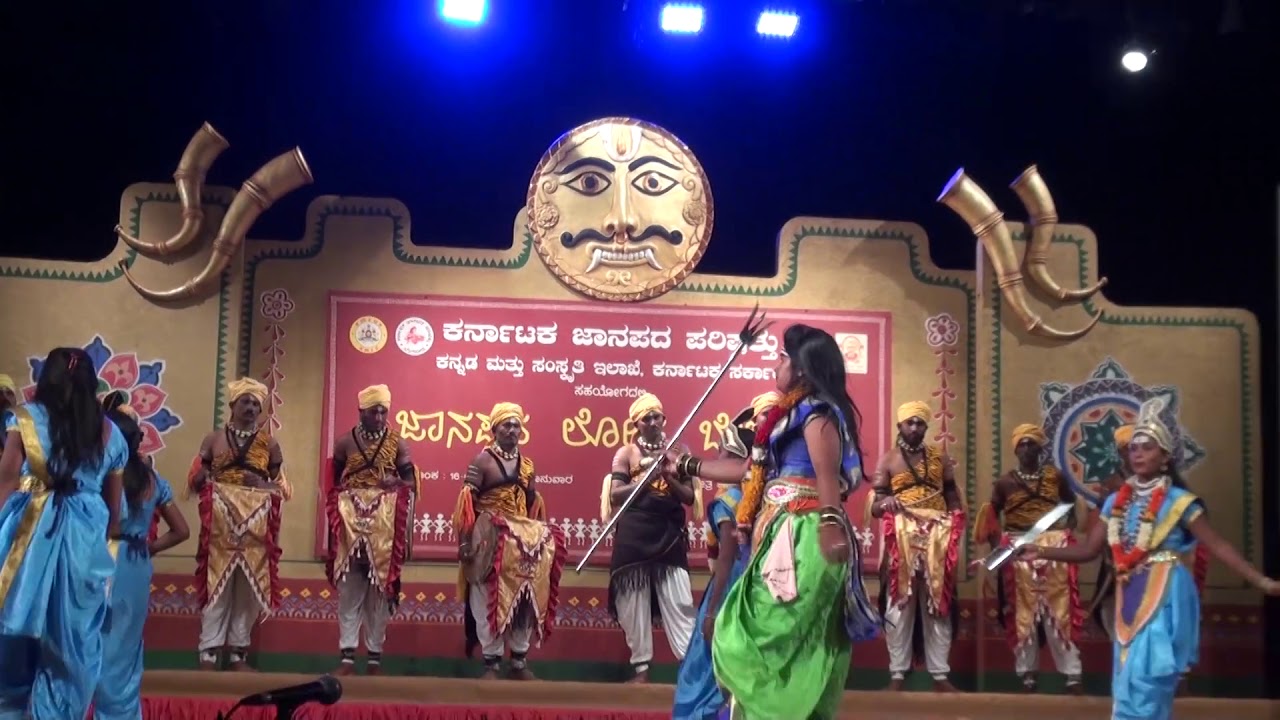 Women performing folk dance veeragase