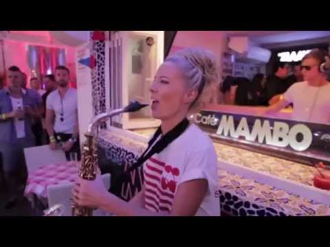 Cute girl playing saxophone