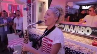 Cute girl playing saxophone