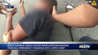 Video shows LMPD chief help woman who crashed into him while having medical emergency