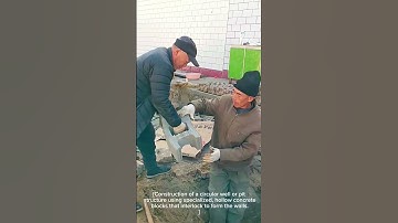 Construction of a circular well or pit structure using specialized, hollow concrete blocks tha ....