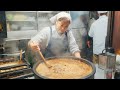 Unbelievable huge queue meat stew bowl in big hot pot in tokyo japanese street food   