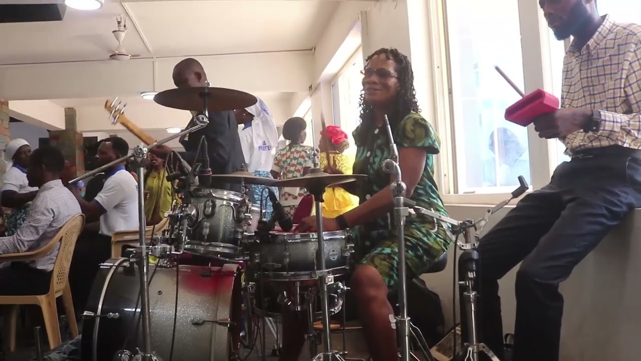 When She is around the men don't want to play the DRUMS 
