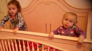 Kate And Elle Playing In Kates Crib