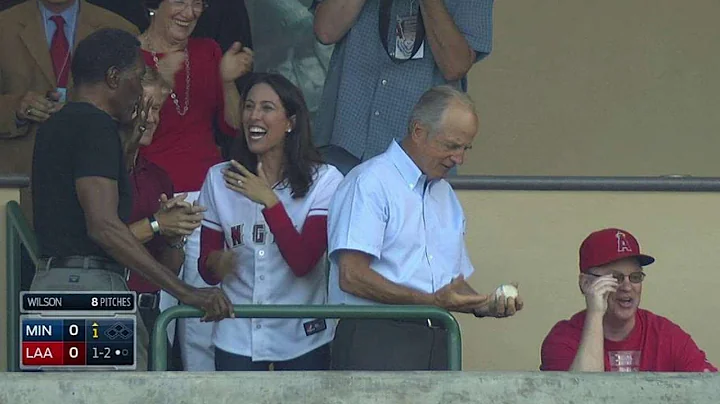 Commissioner Ueberroth snags a foul ball