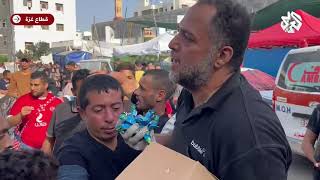 شاهد .. فلسطيني يوزع الحلوى بعد استشهاد أفراد عائلته في القصف على غزة ويكشف سبب تصرفه بكلمات مؤثرة