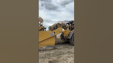 Cat 623K elevating scraper. Similar to conventional scraper, but single engine and self loads