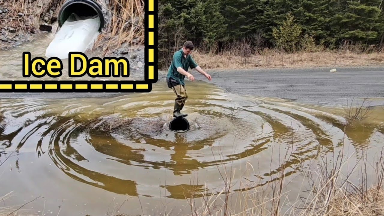 Pushing Down A Culvert To Releave A Blockage