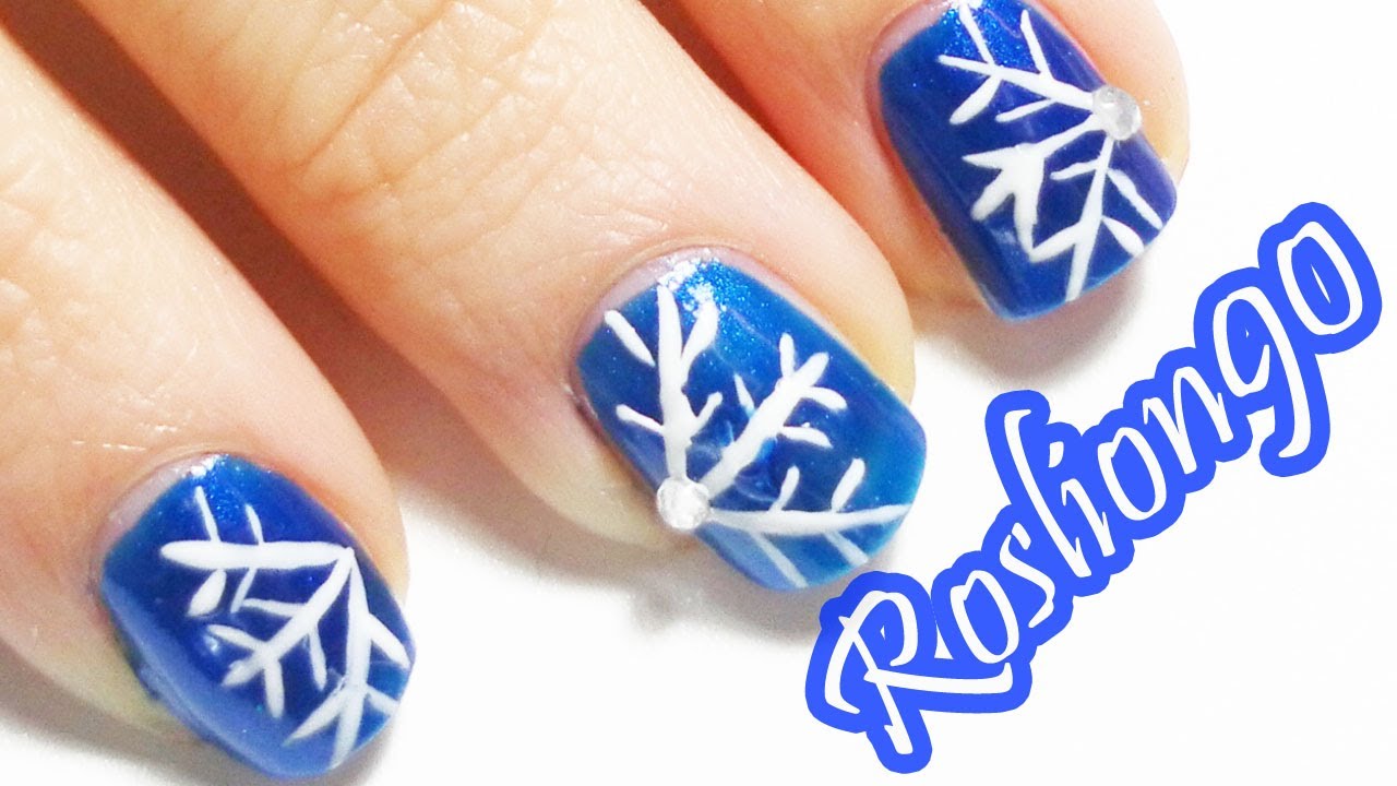 3. Easy Snowflake Nail Art - wide 6