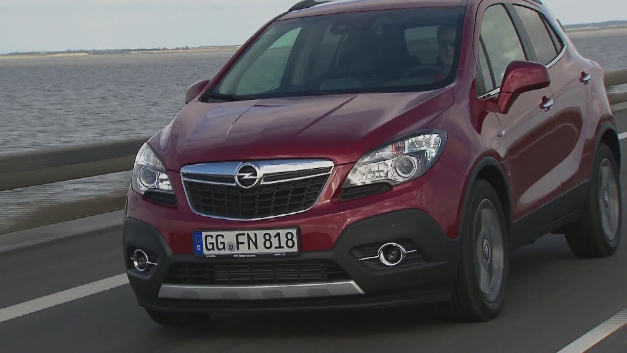 Опель мокка ближний свет. Опель Мокка 2007. Opel Mokka Electric. Opel Mokka 2022 бордовая. Опель Мокка красный.