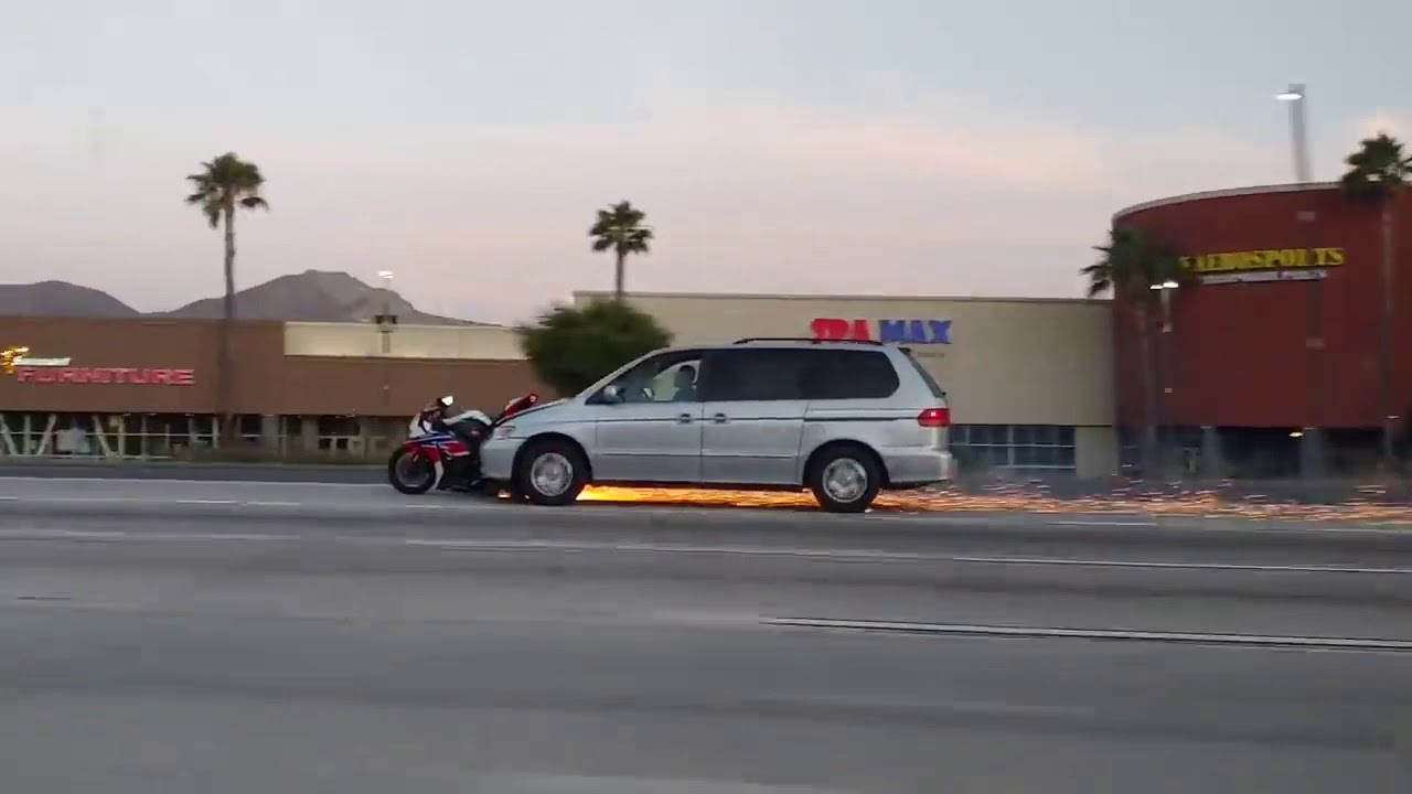 Van Driver Hits Motorcycle and Drags it Along on Highway - YouTube