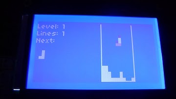 Playing Tetris on an Arduino (Atmega328) on a breadboard with a joystick and 128x64 LCD.