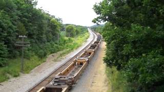 CSX GEs on a BNSF Baretable