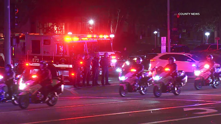First Responders Escort Body of Officer Nicholas V...
