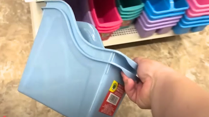 Put a Dollar Store book bin in your kitchen cabinet (this is BRILLIANT!)
