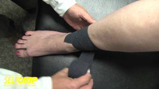 Selfgrip® for taping a shin splint injury.