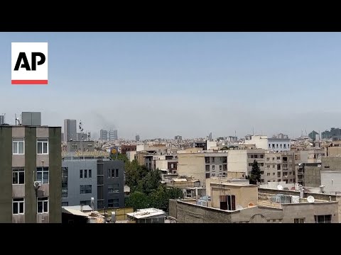 Smoke rises in northern Tehran following new strikes by Israel