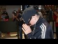 Katy Perry Tries To Hide From Cameras And Fans At LAX And Gets Booed