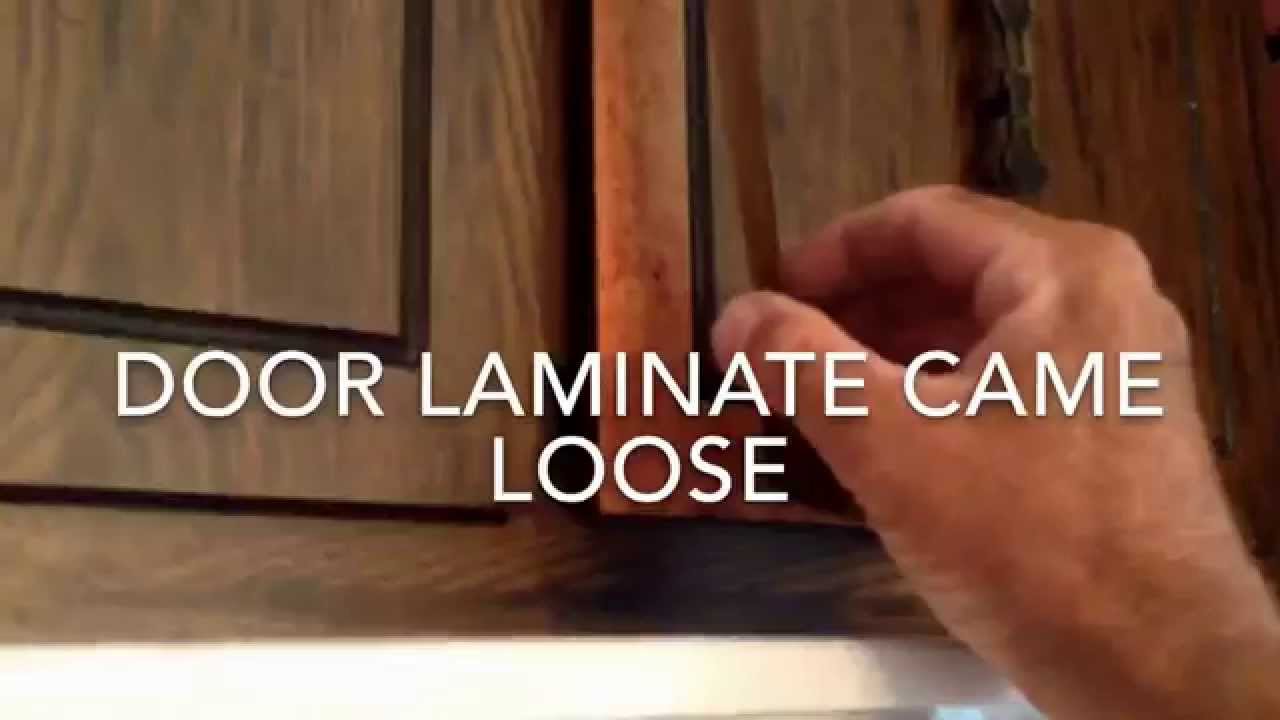 How to Reglue Laminate On Cabinet Door