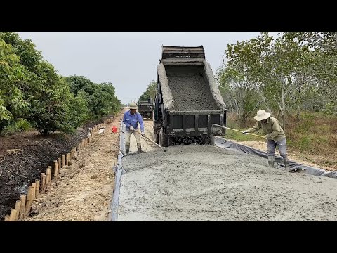 Concrete Road Construction Technology With Concrete Mixer Truck And Trucks - Construction Works