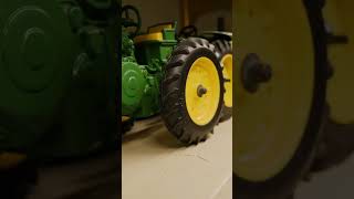 Check out this toy collection of cars, trucks, tractors, and automobiles!