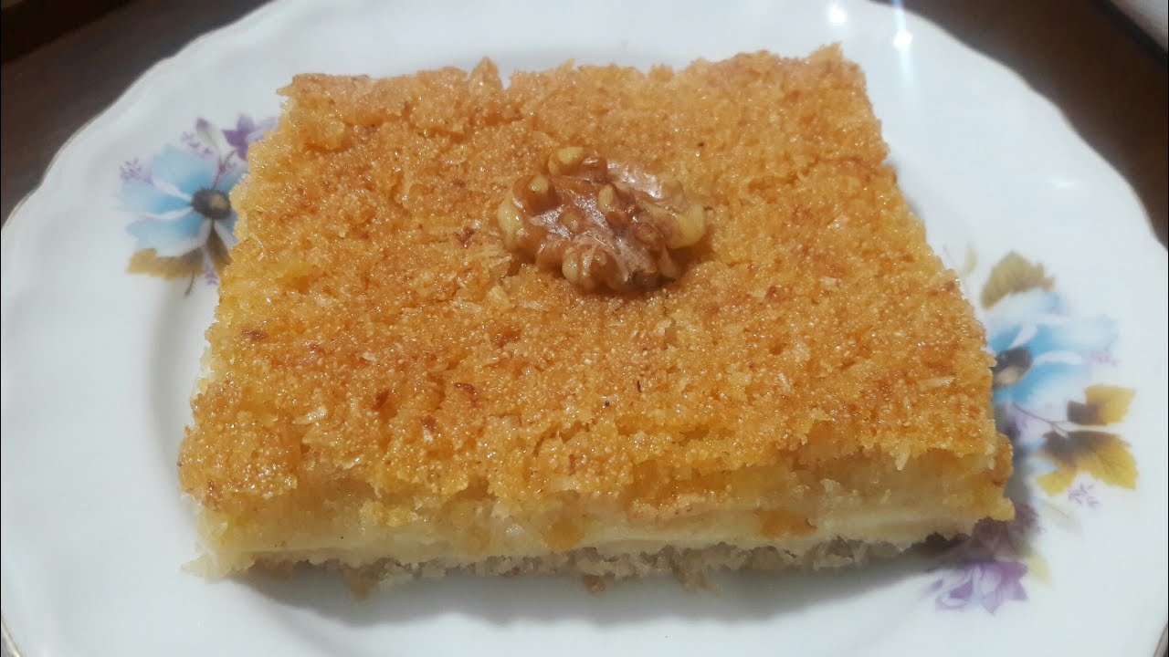 طبقة كنافة وطبقة بسبوسة بينهم  قشطة تخيلوأ بقى الروعة/وخطوة واحدة بس حتمنع الشربات يسكر منك ابدا