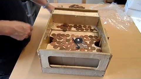 How to build an arcade coin pusher using recycled materials
