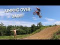 JUMPING OVER MY DAD ON A DIRT BIKE!!!