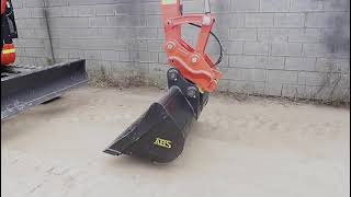 Operating a quick hitch on a Kubota u55
