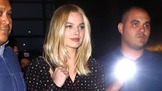 Margot Robbie Rushes To Catch A Flight