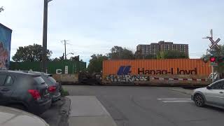 CP 134 intermodal/mixed freight meets short 101 intermodal stack train at West Toronto junction.