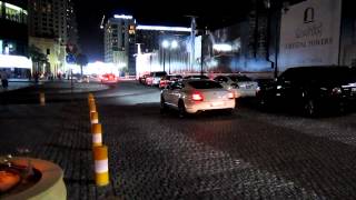 white Bentley Continental GT - drive by - Dubai Marina