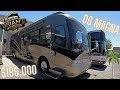 06 Country Coach Magna 42’ Show stopping paint.