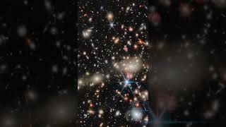 Webb Captures A Massive Cluster Bending Light From The Early Universe