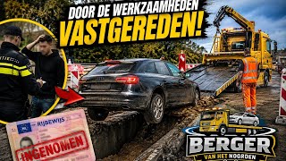 auto rijd door wegwerkzaamheden en rijdt zich vast