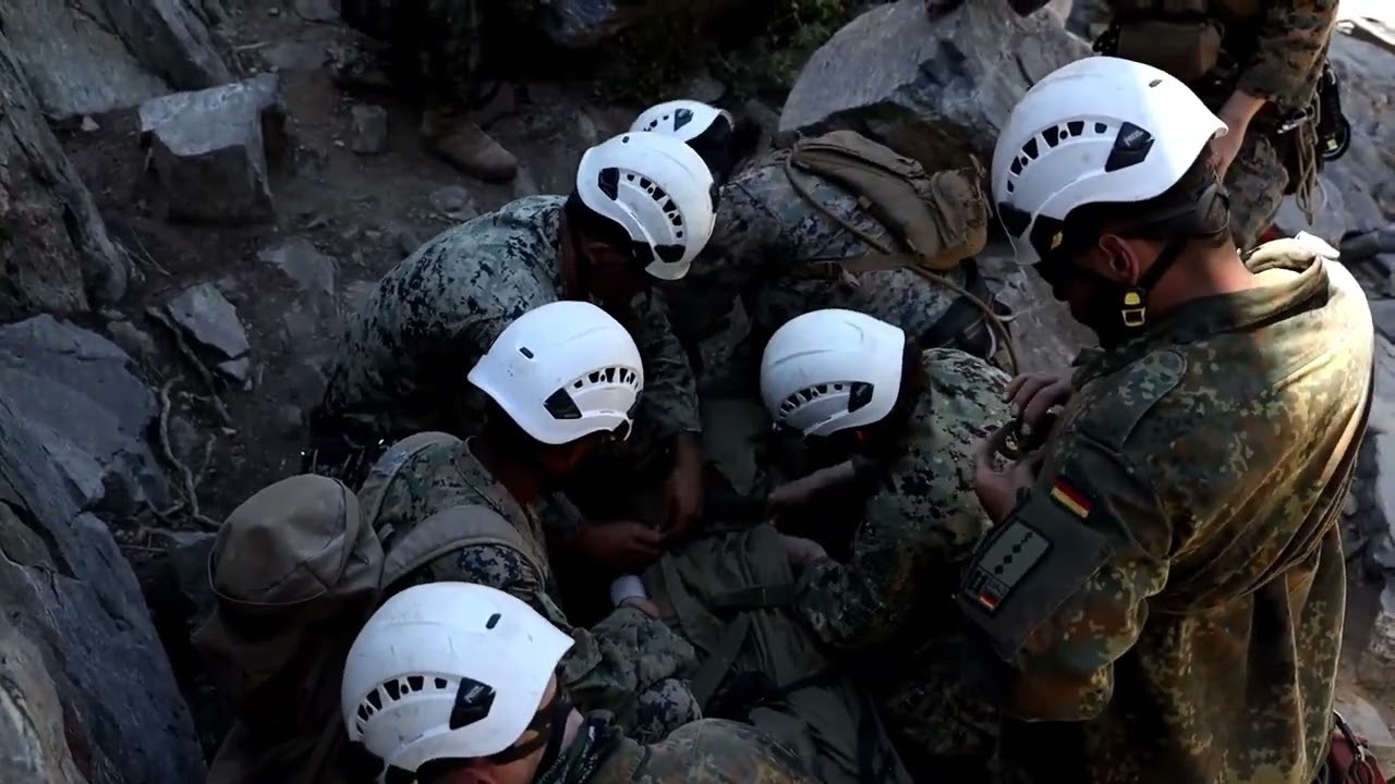 U.S. sailors and Allies soldiers conduct patient evacuation during in Califronia. NATO