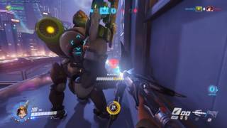 Brian pulls Mei off of the Map with Orisa