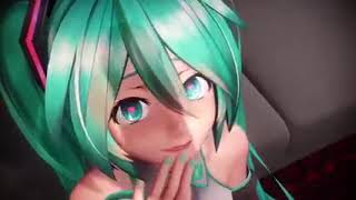 Miku stares at a BIG & massive uh....