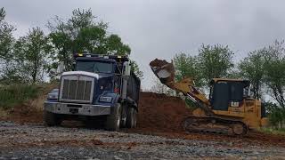 953 d cat track loader operator loading trucks
