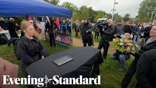 Environmentalists hold ‘wake’ for Lough Neagh over toxic algae bloom