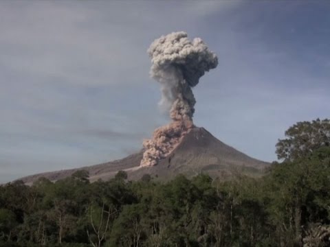 Raw: Indonesia's Sinabung Volcano Spews Hot Ash