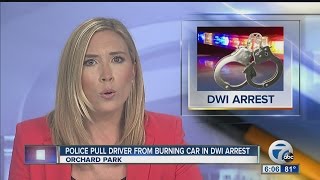 Police pull driver from burning car in DWI arrest