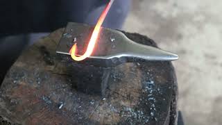 Forging viking age fishing hooks (Turn on subtitles for captions.)