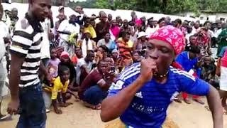 MAN CUTS FACE AND HAND WITH KNIFE: Liberian Gola Performers