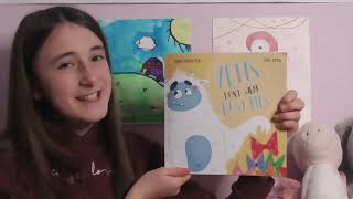Ruby reads 'YETIS DON'T WEAR BOW TIES' written by Janice Hostetter and illustrated by Pixy Petal.